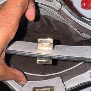 Stylish Gray Handbag with Gold Accents